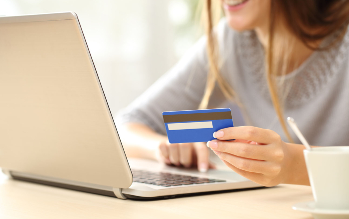 Woman buying online with credit card